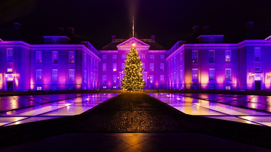 Apeldoorn, The Netherlands - December 20, 2025: Scenic view of Royal Palace het Loo, National museum, illuminated in pink colors during Christmas period in Apeldoorn, The Netehrlands
